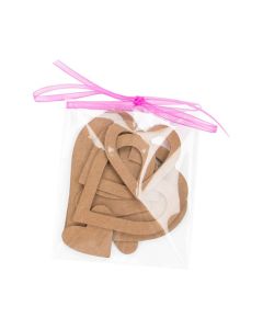 Packaged hearts inside clear bag with adhesive strip on bag